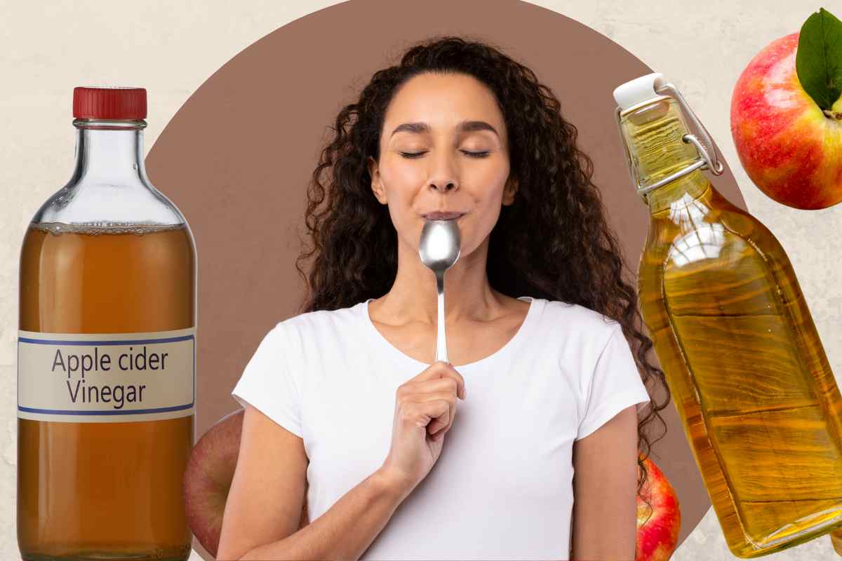 persona con cucchiaio e aceto di mele
