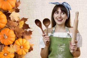 donna con utensili di cucina e foglie e zucche