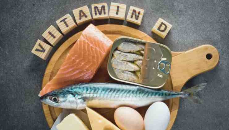 scritta vitamina D e alimenti pesce 
